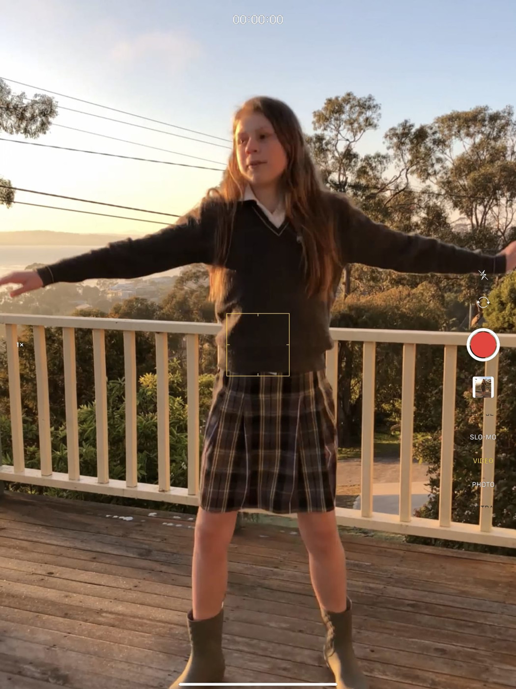 Screenshot of iPad using the Camera App to record a girl dancing